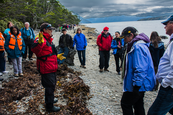 Guide describing the island and the Aguila Glacier in Agostini Sound, Chile.