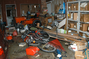Things scattered in garage after Hurricane Katrina.